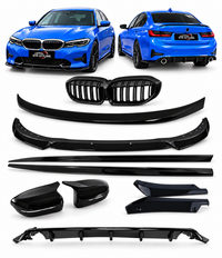 Load image into Gallery viewer, A set of glossy black BMW exterior body kit parts, including a front splitter, rear splitter, side mirrors, and grille trim, displayed on a white background with blue BMW cars shown at the top for context.
